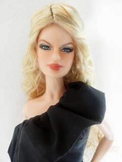 One of the Barbie Basics, repainted and wigged to look like talented 