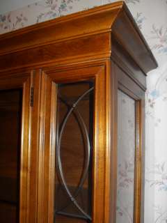 China cabinet   2 piece cabinet with glass shelves and lights  