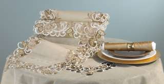 This Lombardi table runner is done in floral embroidered and cutwork 