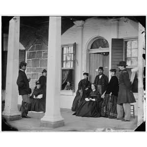   ,Va. Officers,ladies on porch of a garrison house