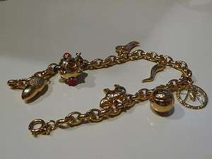 Vintage 18KT Yellow GOLD Italian Charm Bracelet 7 3/4 Inches 7 Charms 