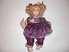 Curly Blonde Doll in Purple Dress   Fine Porcelain   Dandee 