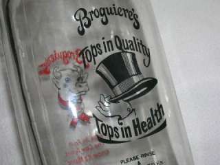 Vintage Broguieres 1 quart glass milk bottle, appx 8.5 inches tall 