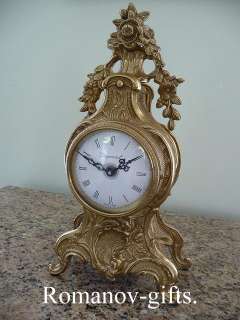 French Louis XV Brass Chateau Clock & pair candelabras  