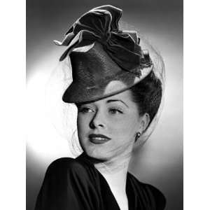 Eleanor Parker Wearing a Tall Crowned Chapeua Made of Felt with Velvet 
